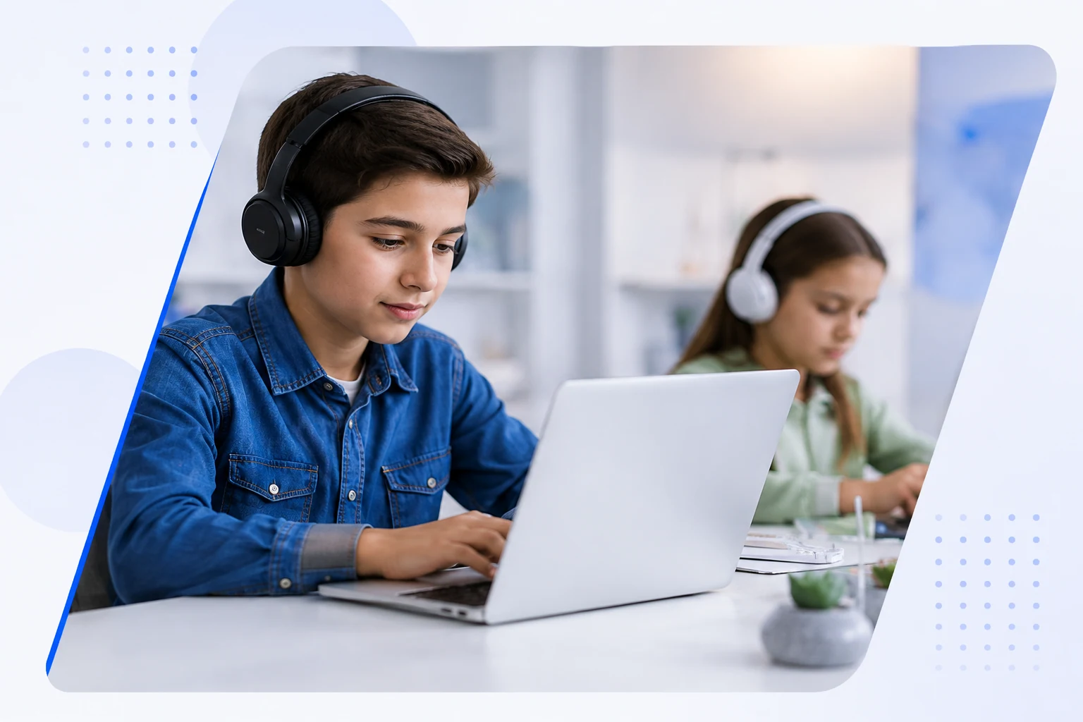 Students learning on laptops in a bright classroom